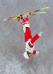 Andy Capicik of Toronto flies over Deer Valley, Utah, to qualify sixth for Tuesday's aerials final at the Winter Olympics, Sat., Feb. 16, 2002.  (CP PHOTO/COA/Mike Ridewood)