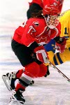 Canada's Cassie Campbell competes in the women hockey action at the 1998 Nagano Winter Olympics. (CP PHOTO/COA/Mike Ridewood)