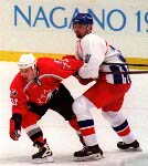 Canada's Eric Desjardins (37) and Theoren Fleury (74) compete in hockey action against the Czech Republic at the 1998 Winter Olympics in Nagano. (CP Photo/COA/ F. Scott Grant )