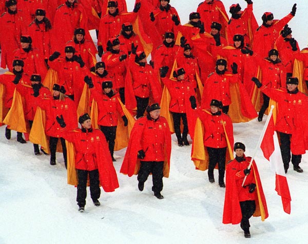 Canada's Kurt Browning carries the flag during the opening ceremony at the 1994 Lillehammer Winter Olympics. (CP PHOTO/ COA)