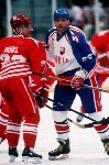 Canada's Greg Parks (left) and Dwayne Norris participate in hockey action at the 1994 Winter Olympics in Lillehammer. (CP Photo/COA/Claus Andersen)