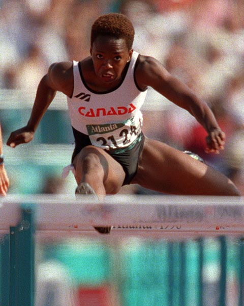Canada's Katie Anderson competing in the 400m hurdles event at the 1996 Atlanta Summer Olympic Games. (CP PHOTO/COA/Claus Andersen)