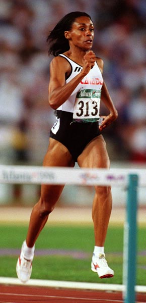 Canada's Rosey Edeh participating in the 400m hurdles event at the 1996 Atlanta Summer Olympic Games.(CP PHOTO/COA/Claus Andersen)