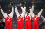 Canada's men's 4x100m relay team left to right Bruny Surin, Donovan Bailey, Robert Esmie and Glenroy Gilbert at the 1996 Atlanta Summer Olympic Games.(CP PHOTO/COA/Claus Andersen)