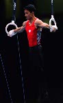Canada's Richard Ikeda competes in a gymnastics event at the 1996 Atlanta Summer Olympic Games. (CP Photo/COA/Claus Andersen)