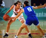 Canada's Karla Karch (left) performs in  women basketball action at the 1996 Atlanta Summer Olympic Games. (CP Photo/COA/Scott Grant)
