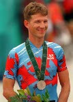 Canada's Brian Walton celebrates the silver medal he won for the men's cycling points race at the 1996 Atlanta Summer Olympic Games. (CP PHOTO/COA/Mike Ridewood)