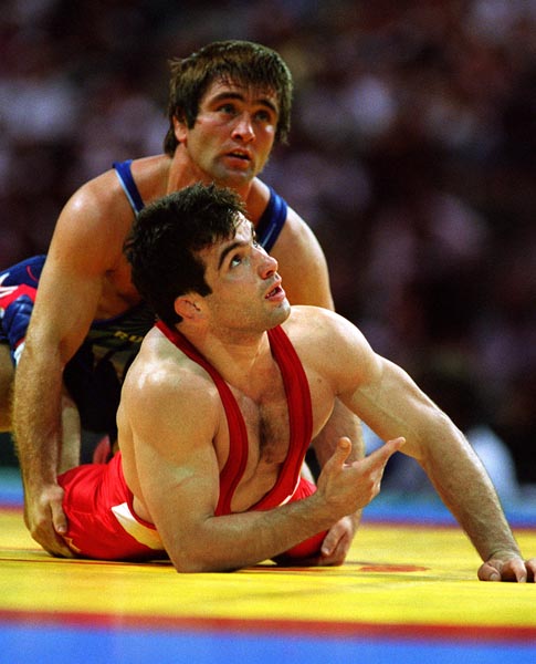 Canada's Oleg Ladik competing in the wrestling event at the 1996 Atlanta Summer Olympic Games. (CP PHOTO/COA/Claus Andersen)