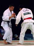 Canada's Taro Tan (right) competes in the judo event at the 1996 Atlanta Summer Olympic Games. (CP Photo/COA/F. Scott Grant)