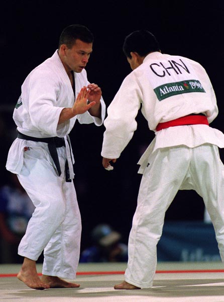 Canada's Taro Tan (left) competing in the Judo event at the 1996 Atlanta Summer Olympic Games. (CP PHOTO/COA/Scott Grant)
