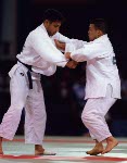 Canada's Taro Tan (right) competes in the judo event at the 1996 Atlanta Summer Olympic Games. (CP Photo/COA/F. Scott Grant)