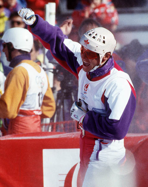 Canada's Philippe Laroche celebrates the gold medal he won in the aerial ski event at the 1992 Albertville Olympic winter Games. (CP PHOTO/COA/F. Scott Grant)
