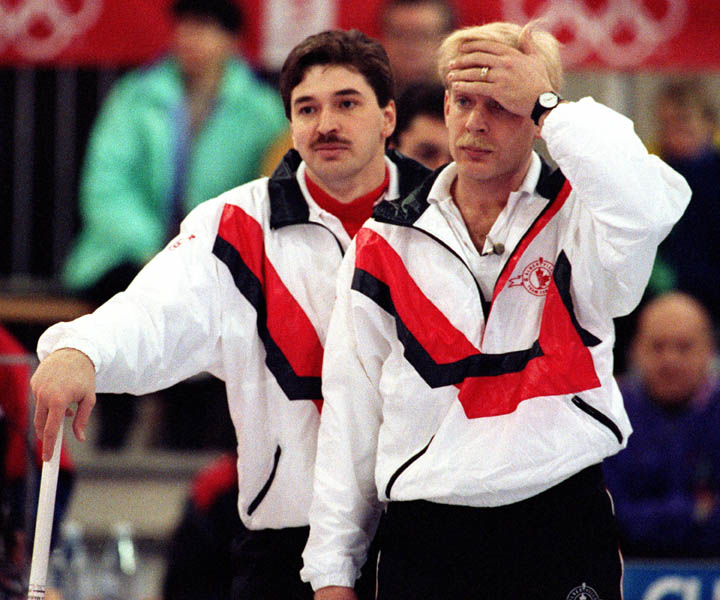 Canada's Kevin Park (left) and Kevin Martin competing in the curling event at the 1992 Albertville Olympic winter Games. (CP PHOTO/COA/Ted Grant)