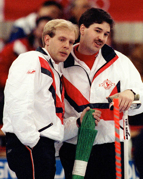 Canada's Kevin Park (right) and Kevin Martin competing in the curling event at the 1992 Albertville Olympic winter Games. (CP PHOTO/COA/Ted Grant)