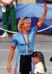 Canada's Curt Harnett the bronze medal he won in the track event at the 1992 Olympic games in Barcelona. (CP PHOTO/ COA/ Claus Andersen)