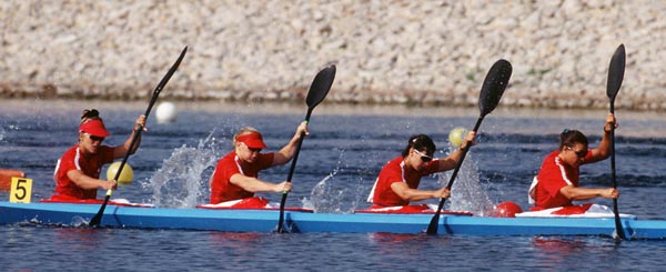 (From left to right) Canada's Klari MacAskill, Kevyn Stafford, Alison Herst and Caroline Brunet competing in the kayak event at the 1992 Olympic games in Barcelona. (CP PHOTO/ COA/ F.S. Grant)