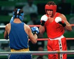 Cuba's Hector Vinent Charon (right) competing in the boxing event at the 1992 Olympic games in Barcelona. (CP PHOTO/ COA/ F.S.Grant)