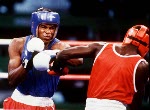 Canada's Tom Glesby (right) competing in the boxing event at the 1992 Olympic games in Barcelona. (CP PHOTO/ COA/ F.S.Grant)