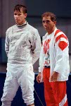 Canada's  Leszek Nowosielski (left) and coach Henri Sassine competing in the fencing event at the 1992 Olympic games in Barcelona. (CP PHOTO/ COA/ T.Grant)
