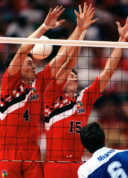 Canada's Kent Greves (left) and Russ Paddock competing in the volleyball event at the 1992 Olympic games in Barcelona. (CP PHOTO/ COA/ Claus Andersen)