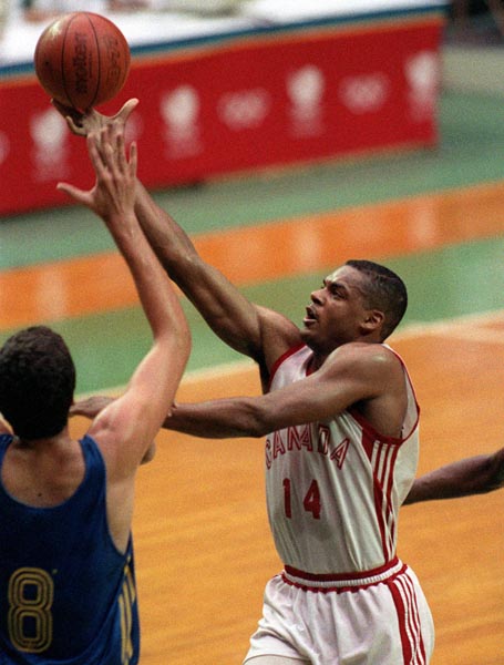 Canada's Wayne Yearwood (14) competing in the basketball event at the 1988 Olympic games in Seoul. (CP PHOTO/ COA/ F. Scott Grant)
