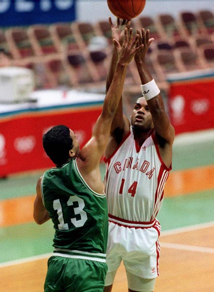 Canada's Wayne Yearwood (right) competing in the basketball event at the 1988 Olympic games in Seoul. (CP PHOTO/ COA/ F. Scott Grant)
