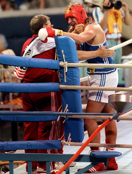 Canada's Tom Glesby (right) and his coach Ray Napper competing in the boxing event at the 1988 Olympic games in Seoul. (CP PHOTO/ COA/ S.Grant)