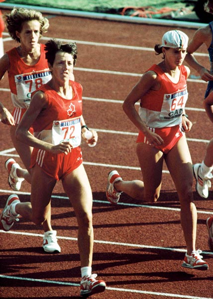 Canada's Lizanne Bussieres (#78) Odette Lapierre (#72) and Ellen Rochefort (#64) competing in the marathon event at the 1988 Olympic games in Seoul. (CP PHOTO/ COA/F.S.Grant)