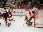 Canada's Marc Habscheid (#14) Timothy Walters (#2) and Sean Burke (#1) participate in the hockey event at the 1988 Winter Olympics in Calgary. (CP PHOTO/ COA/ S.Grant)
