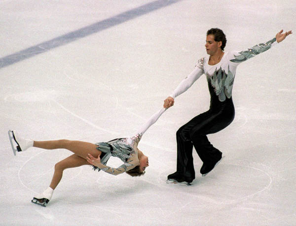 Canada's Isabelle Brasseur (left) and Loyd Eisler participate in the pairs figure skating event at the 1988 Winter Olympics in Calgary. (CP PHOTO/COA)