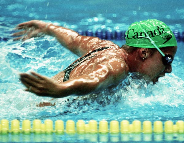 Canada's Donna McGinnis competing in the swimming event at the 1988 Olympic games in Seoul. (CP PHOTO/ COA/ Cromby McNeil)