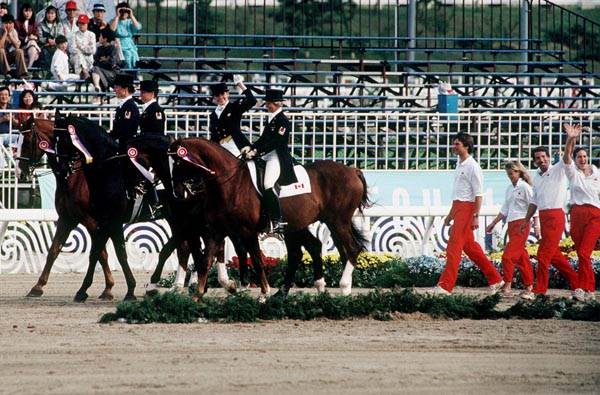 Canadian Bronze Medalist Dressage Team at the equestrian event site at the 1988 Olympic games in Seoul. (CP PHOTO/ COA/ C. McNeil)