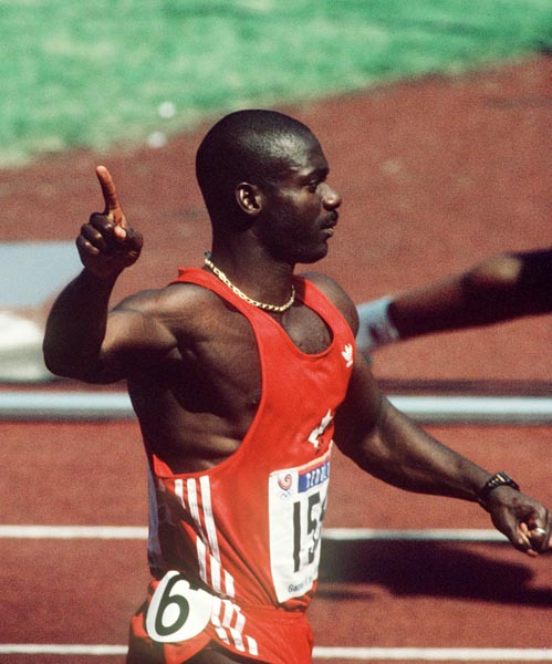 Canada's Ben Johnson wins the 100m event at the 1988 Olympic games in Seoul. (CP PHOTO/ COA/ Cromby McNeil)