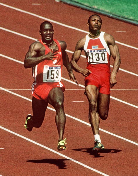 Canada's Ben Johnson (Left) and Calvin Smith from the U.S.A. compete in the 100m event at the 1988 Olympic games in Seoul. (CP PHOTO/ COA/ Cromby McNeil)
