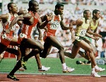 Canada's Ben Johnson (right) concentrates on the starting blocks for the 100m event at the 1988 Olympic games in Seoul. (CP PHOTO/ COA/ Cromby McNeil)