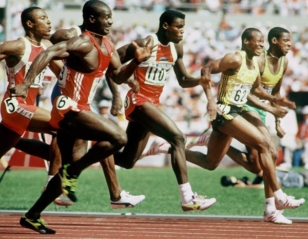 Canada's Ben Johnson (foreground) competes in the 100m event at the 1988 Olympic games in Seoul. (CP PHOTO/ COA/ Cromby McNeil)