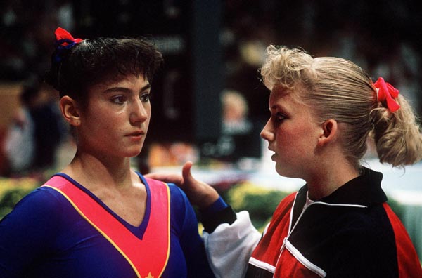 Canada's Monica Covacci (left) and Lynette Wittmeier compete in the gymnastics event at the 1988 Olympic games in Seoul. (CP PHOTO/ COA/ Tim O'lett)