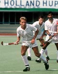 Canada's Ken Goodwin (back) and Michael Muller play field hockey at the 1988 Seoul Olympic Games. (CP Photo/ COA/ T. Grant)