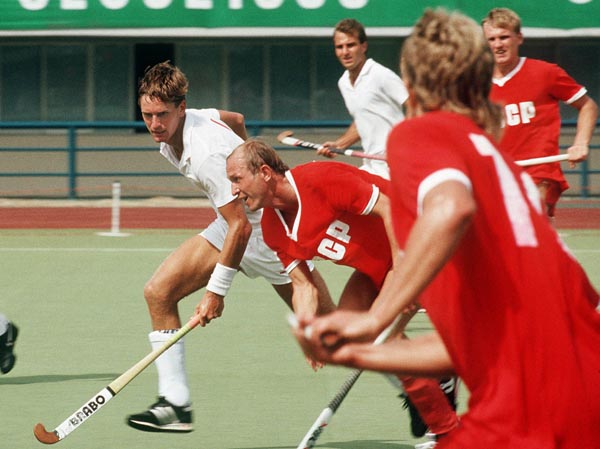 Canada's Pat Burrows (left) and Rick Albert play field hockey at the 1988 Seoul Olympic Games. (CP Photo/ COA/ T. Grant)