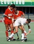 Canada's Pat Burrows (in front) and Hargurnek Sandhu play field hockey at the 1988 Seoul Olympic Games. (CP Photo/ COA/ T. Grant)