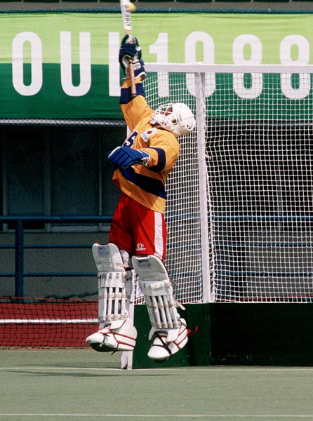 Canada's Ajay Dube playing field hockey at the 1988 Seoul Olympic Games. (CP Photo/ COA/ T. Grant)