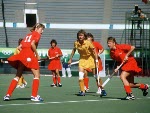 Canada's Sharon Creelman (red) playing field hockey at the 1988 Seoul Olympic Games. (CP Photo/ COA/ T. Grant)