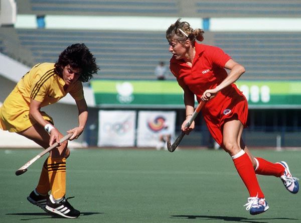 Canada's Michelle Conn (right) plays field hockey at the 1988 Seoul Olympic Games. (CP Photo/ COA/ T. Grant)