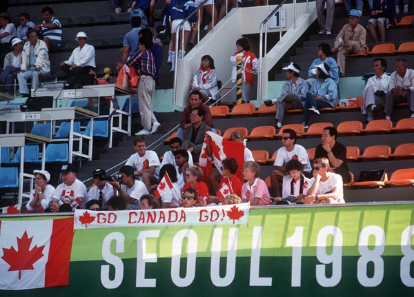 Canada's supporters cheer on at the women's field hockey event at the 1988 Seoul Olympic Games. (CP Photo/ COA/ T. O'lett)