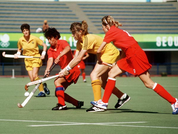 Canada's Sheila Forshaw (left) and Michelle Conn play field hockey at the 1988 Seoul Olympic Games. (CP Photo/ COA/ T. Grant)