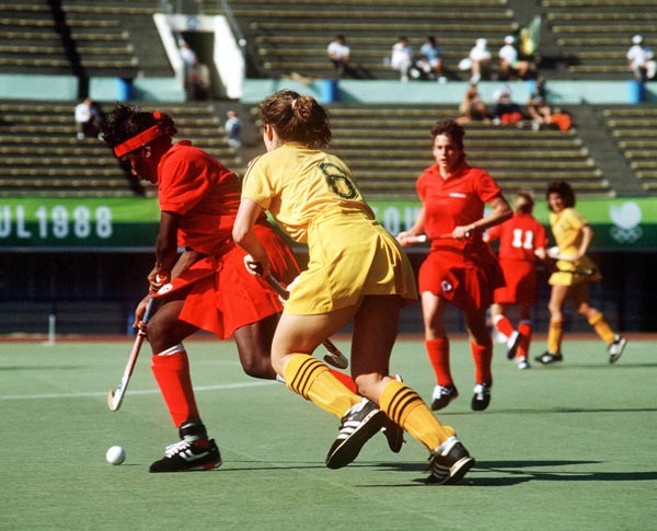 Canada's Sandra Levy (left) plays field hockey at the 1988 Seoul Olympic Games. (CP Photo/ COA/ T. Grant)