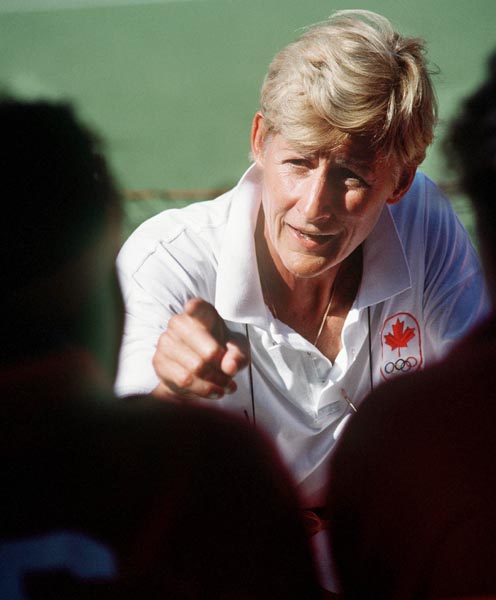 Canada's Marina Van Der Merwe, coach for the women's field hockey team, gives directions at the 1988 Seoul Olympic Games. (CP Photo/ COA/ T. Grant)