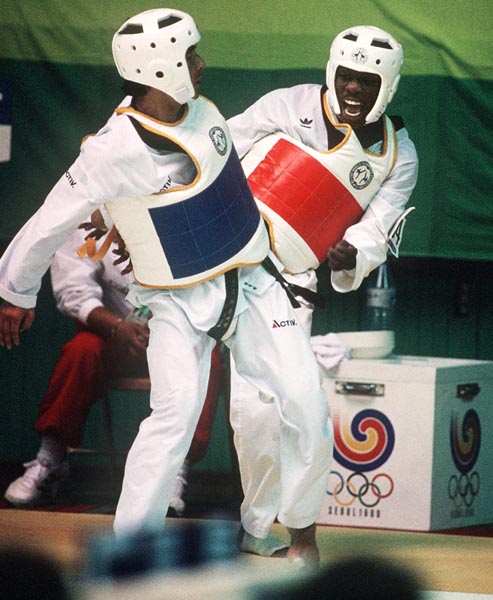 Canada's Albert Smythe (right) competes in the taekwondo event at the 1988 Seoul Olympic Games. (CP PHOTO/COA/ T. Grant)