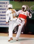 Canada's Albert Smythe (right) competes in the taekwondo event at the 1988 Seoul Olympic Games. (CP PHOTO/COA/ T. Grant)