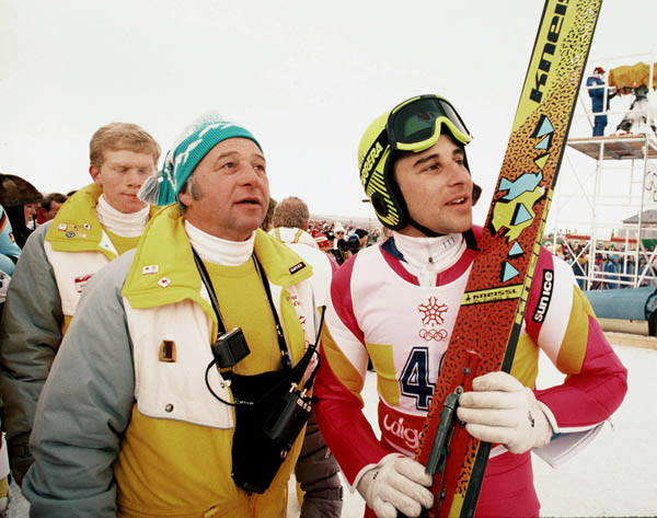 Canada's Ron Richards (right) and his coach Marty Hall participate in the ski jumping event at the 1988 Winter Olympics in Calgary. (CP PHOTO/COA/ J. Gibson)